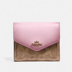 Coach small tri-fold wallet